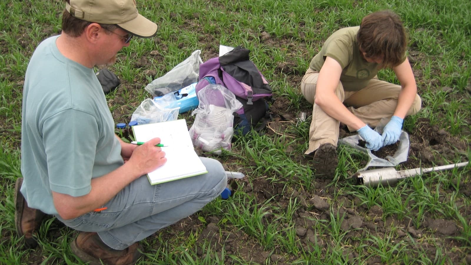 JoAnn Holloway of USGS and Ron Wiederholt of NDSU collecting and documenting soil samples