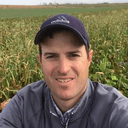 Aaron Hird in a crop field